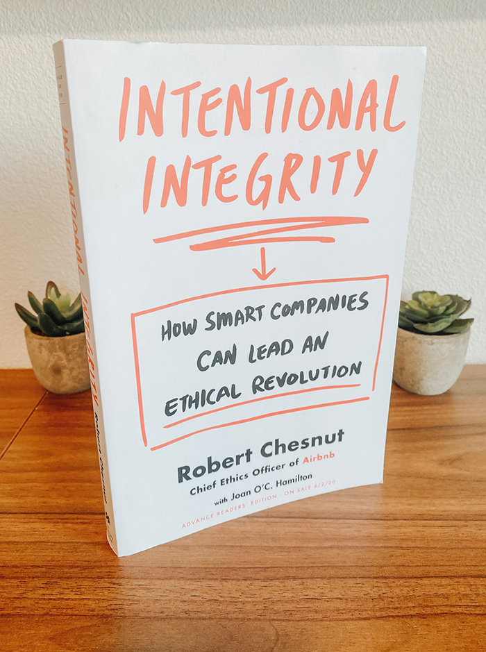 Intentional Integrity Book Cover by Robert Chestnut standing upright on desk